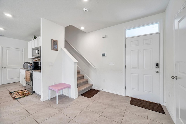 view of tiled foyer