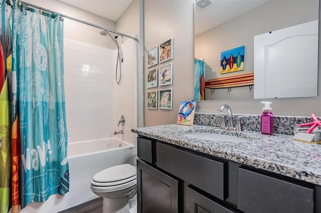 full bathroom with shower / bathtub combination with curtain, hardwood / wood-style floors, vanity, and toilet