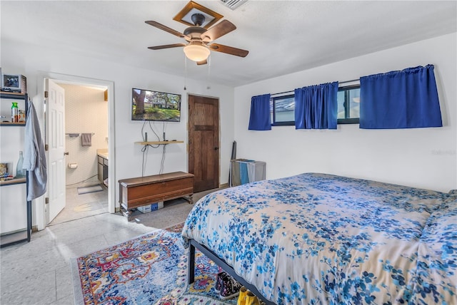 bedroom featuring ceiling fan and ensuite bathroom