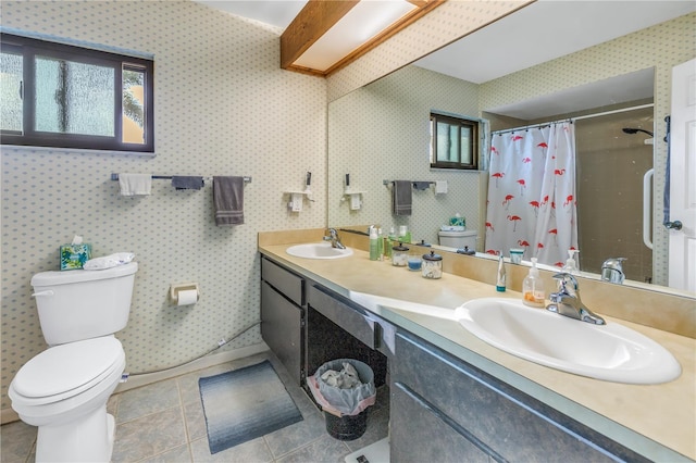 bathroom with tile patterned flooring, vanity, curtained shower, and toilet