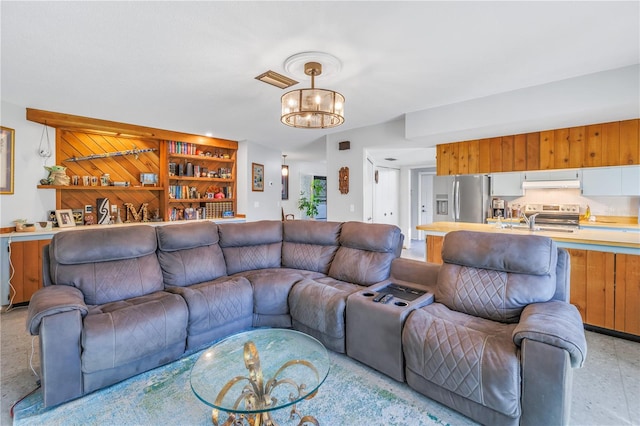 living room with a chandelier