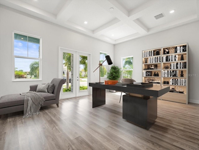 office space featuring beam ceiling, french doors, wood-type flooring, and coffered ceiling