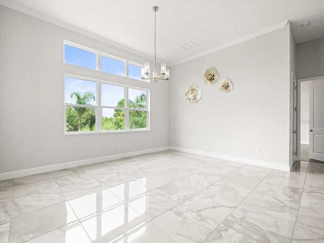 spare room featuring crown molding and an inviting chandelier