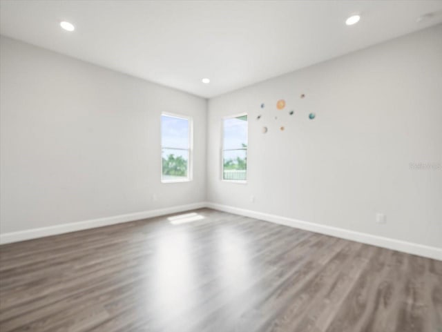 empty room featuring hardwood / wood-style floors