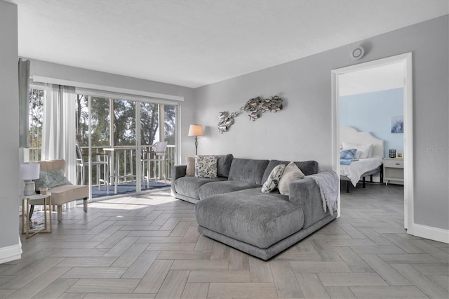 living room with parquet flooring