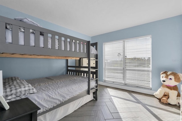 bedroom featuring parquet floors