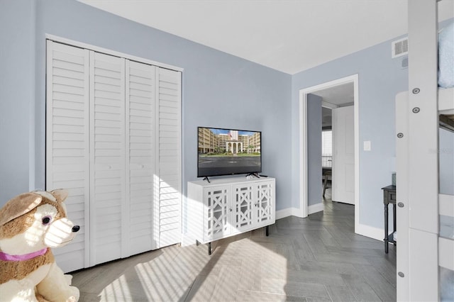 living room featuring parquet floors