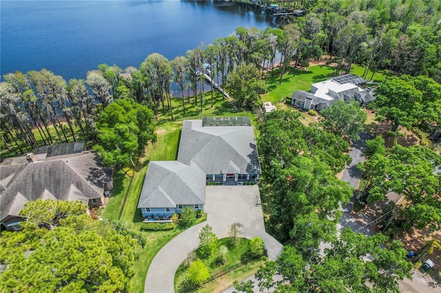 birds eye view of property with a water view