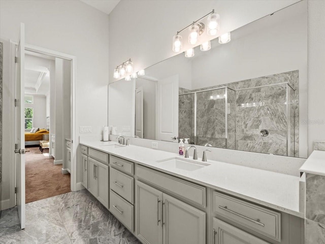 bathroom with vanity and a shower with shower door