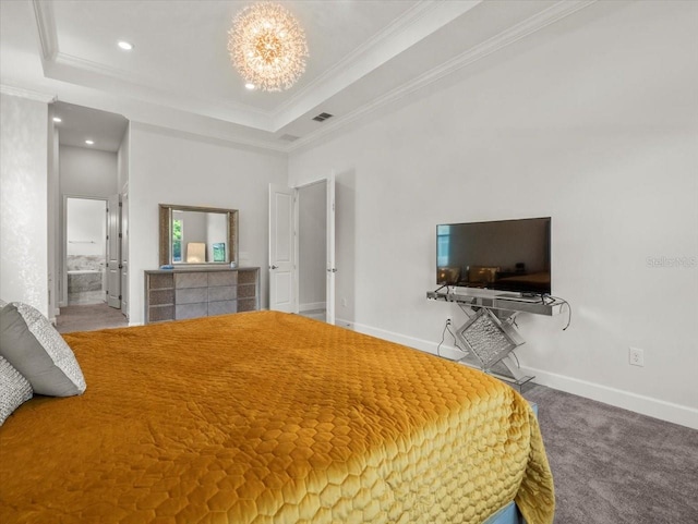 unfurnished bedroom with ensuite bath, a tray ceiling, crown molding, an inviting chandelier, and carpet floors