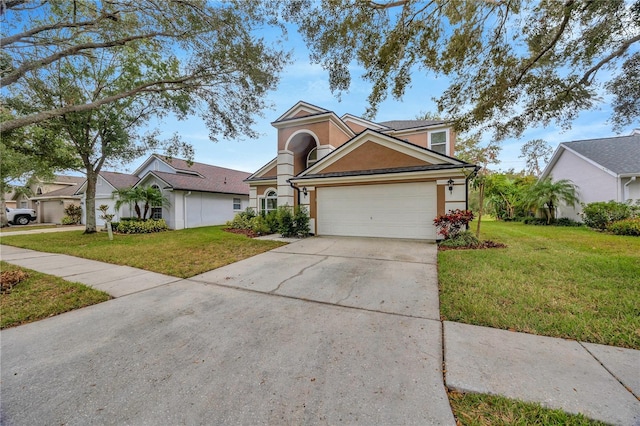 front facade with a garage and a front yard