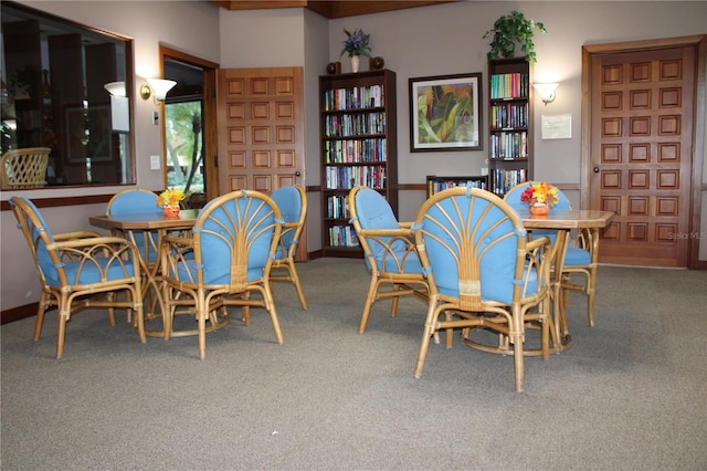 dining room featuring carpet