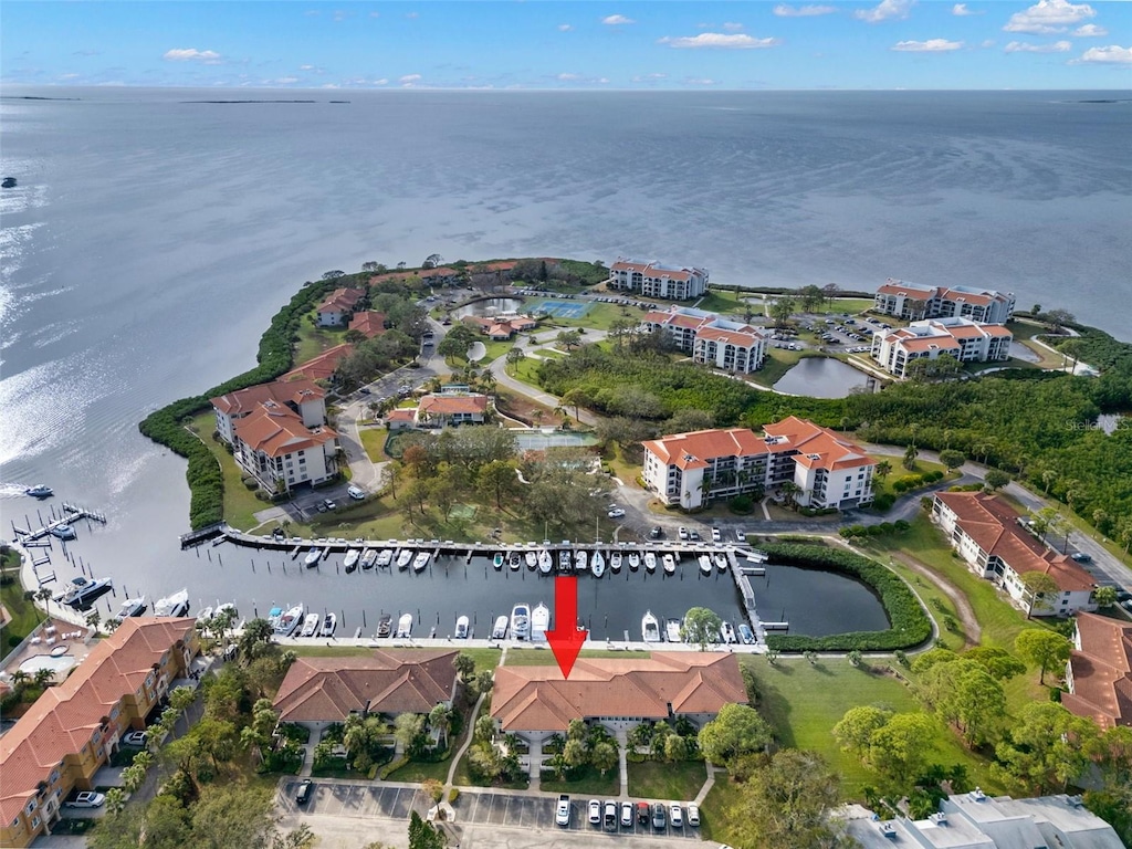 birds eye view of property featuring a water view