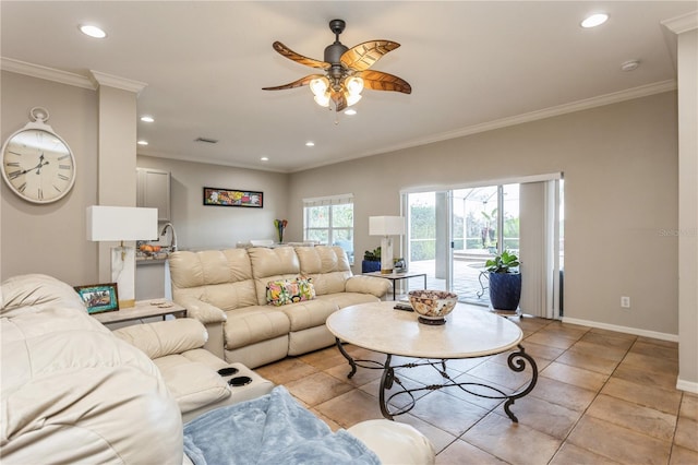 tiled living room featuring ornamental molding and ceiling fan