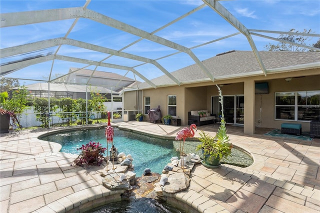 view of pool featuring ceiling fan, a lanai, and a patio