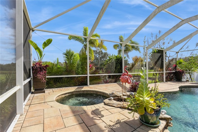 view of pool featuring a lanai and a patio area