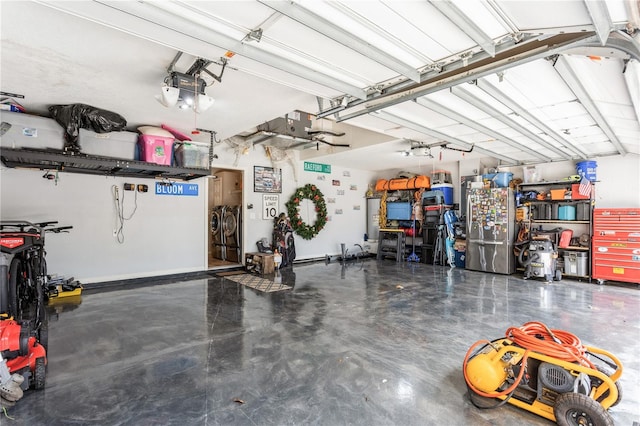 garage with stainless steel refrigerator