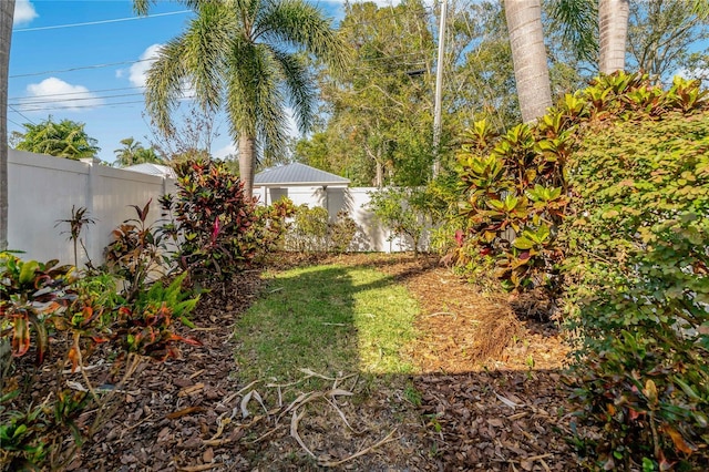 view of yard featuring a fenced backyard