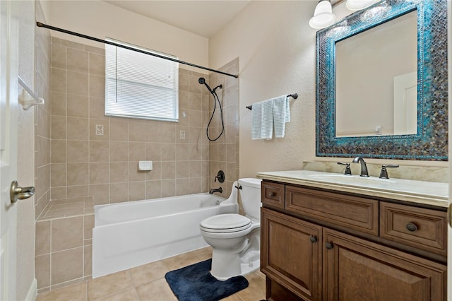 bathroom with tile patterned flooring, shower / tub combination, vanity, and toilet