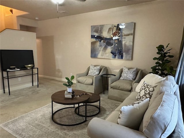 living room featuring baseboards