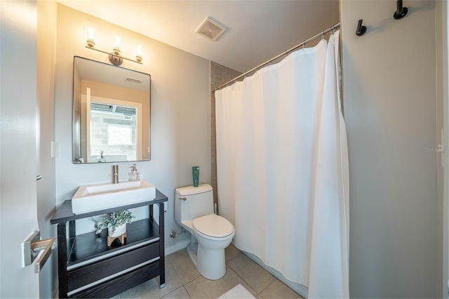 full bathroom featuring visible vents, toilet, a shower with curtain, tile patterned flooring, and vanity