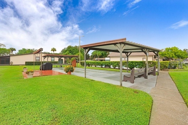 view of home's community featuring a yard