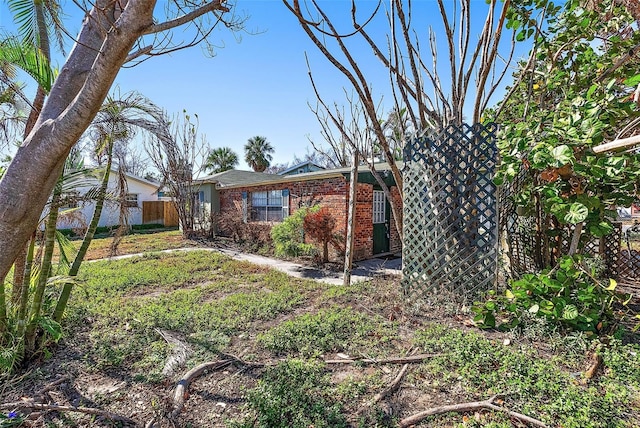 exterior space with a front lawn