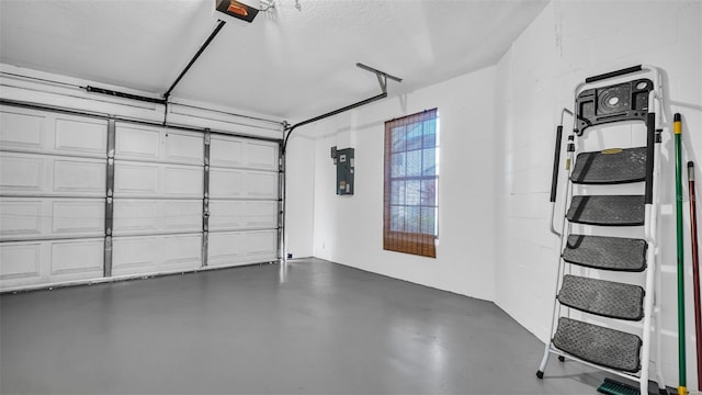 3499 Cedar Ln, Palm Harbor, FL 34684 - garage with electric panel and a garage door opener