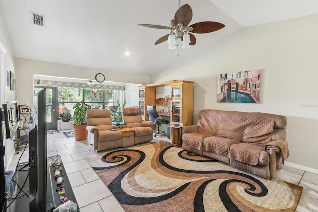 tiled living room with ceiling fan and vaulted ceiling