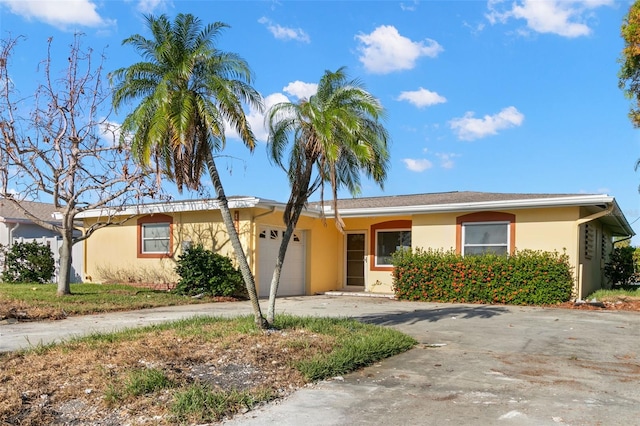 single story home with a garage