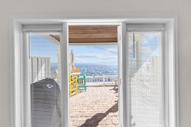 entryway featuring a water view