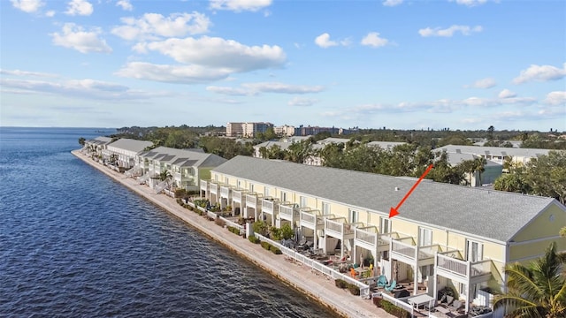 birds eye view of property featuring a water view