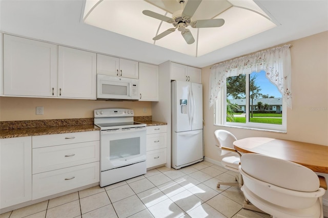 kitchen featuring ceiling fan, white cabinetry, white appliances, and light tile patterned floors