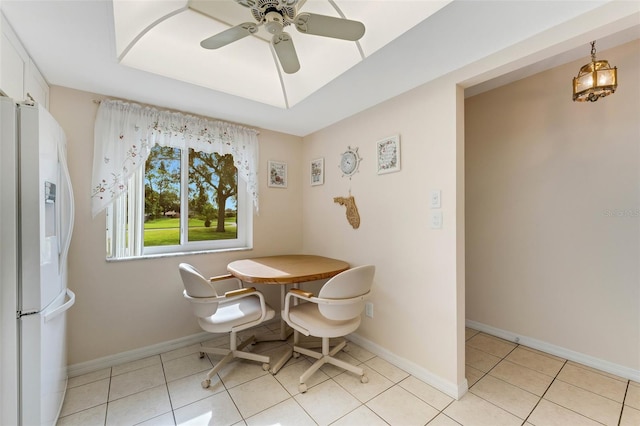 dining room featuring ceiling fan and light tile patterned flooring