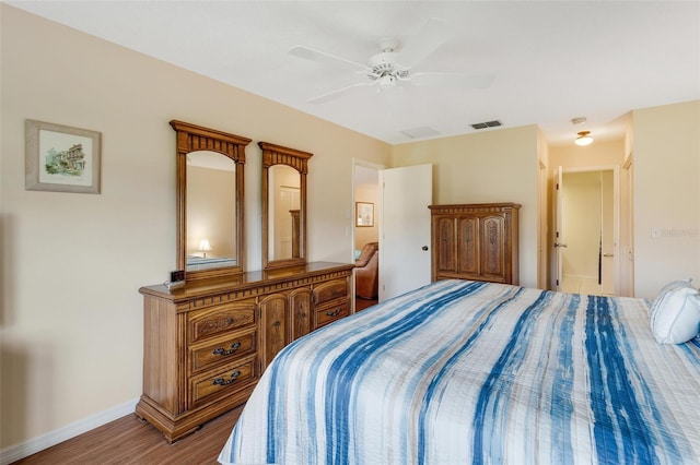 bedroom featuring ceiling fan and wood-type flooring