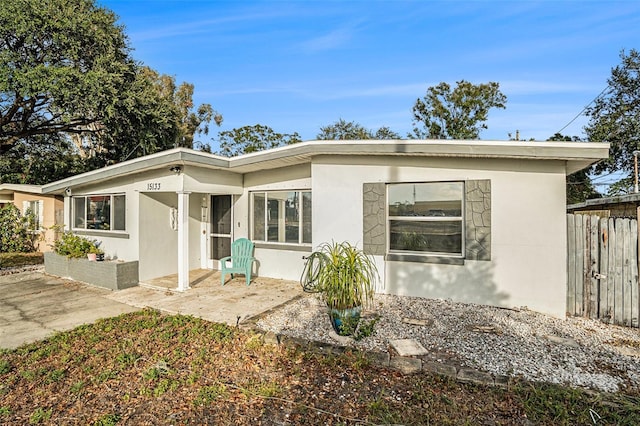 rear view of property with a patio area