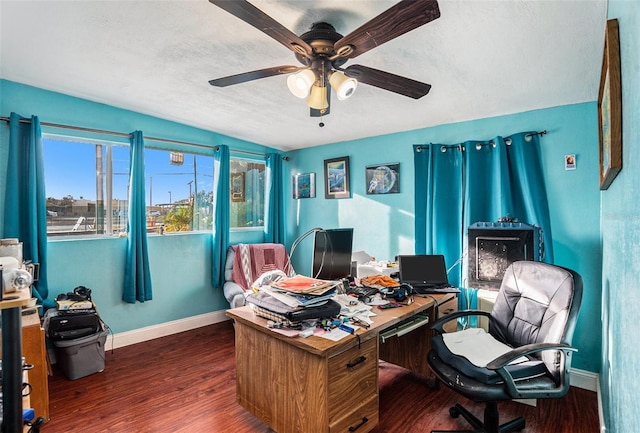 office with a textured ceiling, dark wood-type flooring, ceiling fan, and lofted ceiling