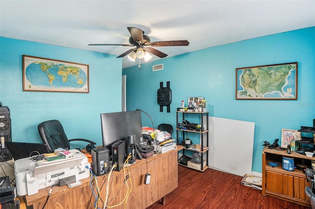 home office featuring dark wood-type flooring and ceiling fan