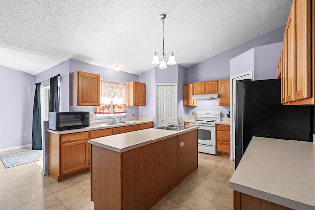 kitchen featuring a center island with sink, refrigerator, hanging light fixtures, vaulted ceiling, and electric range