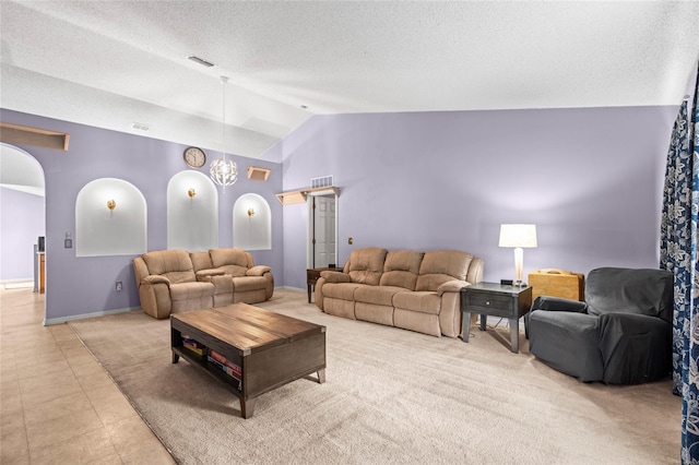 living room with light carpet, a textured ceiling, and vaulted ceiling