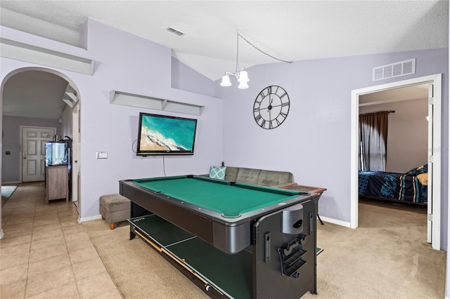 playroom featuring light carpet, a textured ceiling, lofted ceiling, and billiards