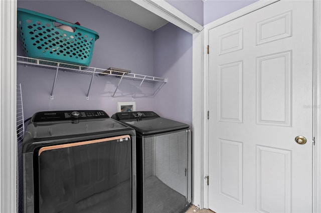 2102 Deltona Blvd, Spring Hill, FL 34606 - laundry room featuring washer and clothes dryer