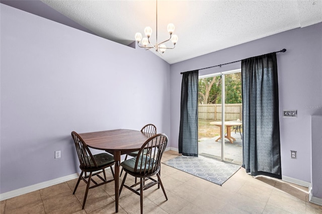2102 Deltona Blvd, Spring Hill, FL 34606 - dining room with lofted ceiling, a chandelier, baseboards, and a textured ceiling