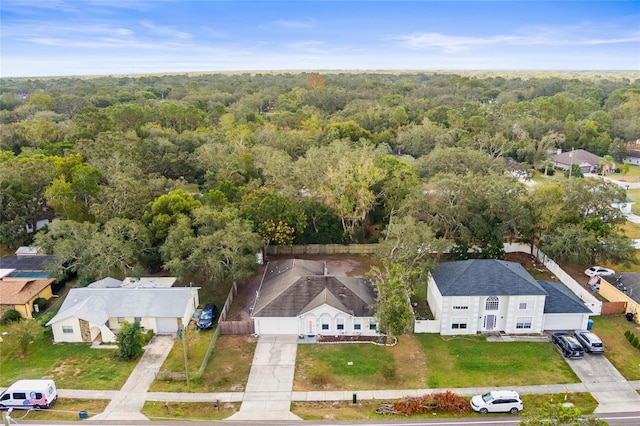 2102 Deltona Blvd, Spring Hill, FL 34606 - aerial perspective of suburban area with a forest