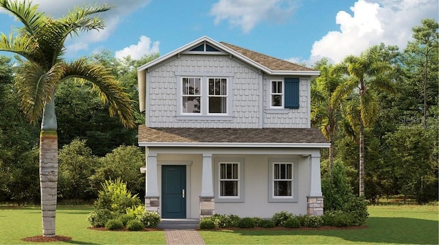 craftsman-style home with a front lawn