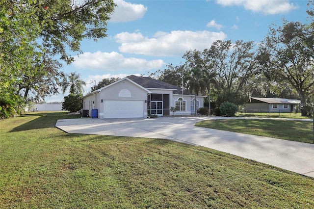 ranch-style home with a front lawn and a garage