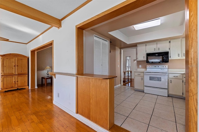 kitchen with light hardwood / wood-style flooring, ornamental molding, and white electric range