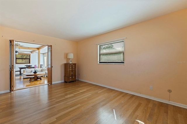 spare room with light wood-type flooring