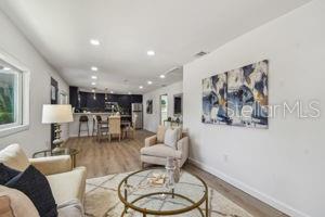 living room with wood-type flooring