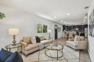 living room with light wood-type flooring